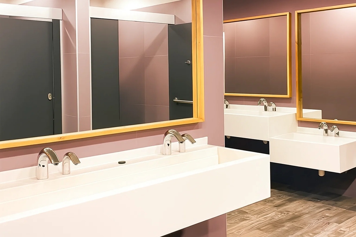 Sustainable washroom with automatic dispensers