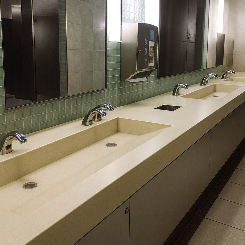 Chef using touch-free automatic soap dispenser in prep area