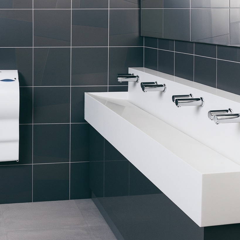 Technical cutaway showing soap dispenser pump and reservoir