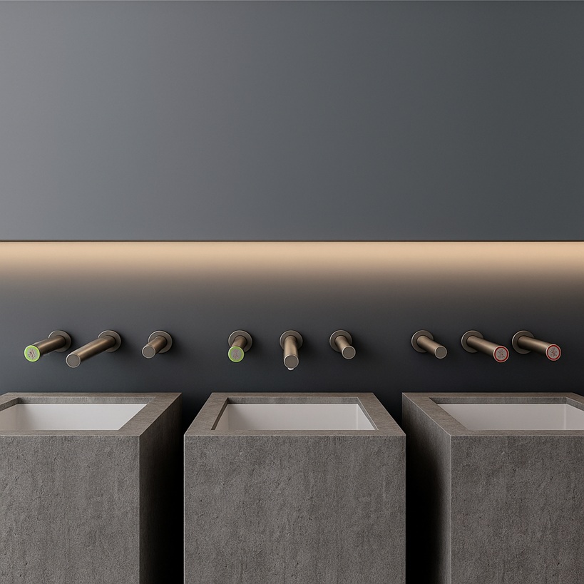 Healthcare facility restroom with touchless dispensers installed at multiple handwashing stations