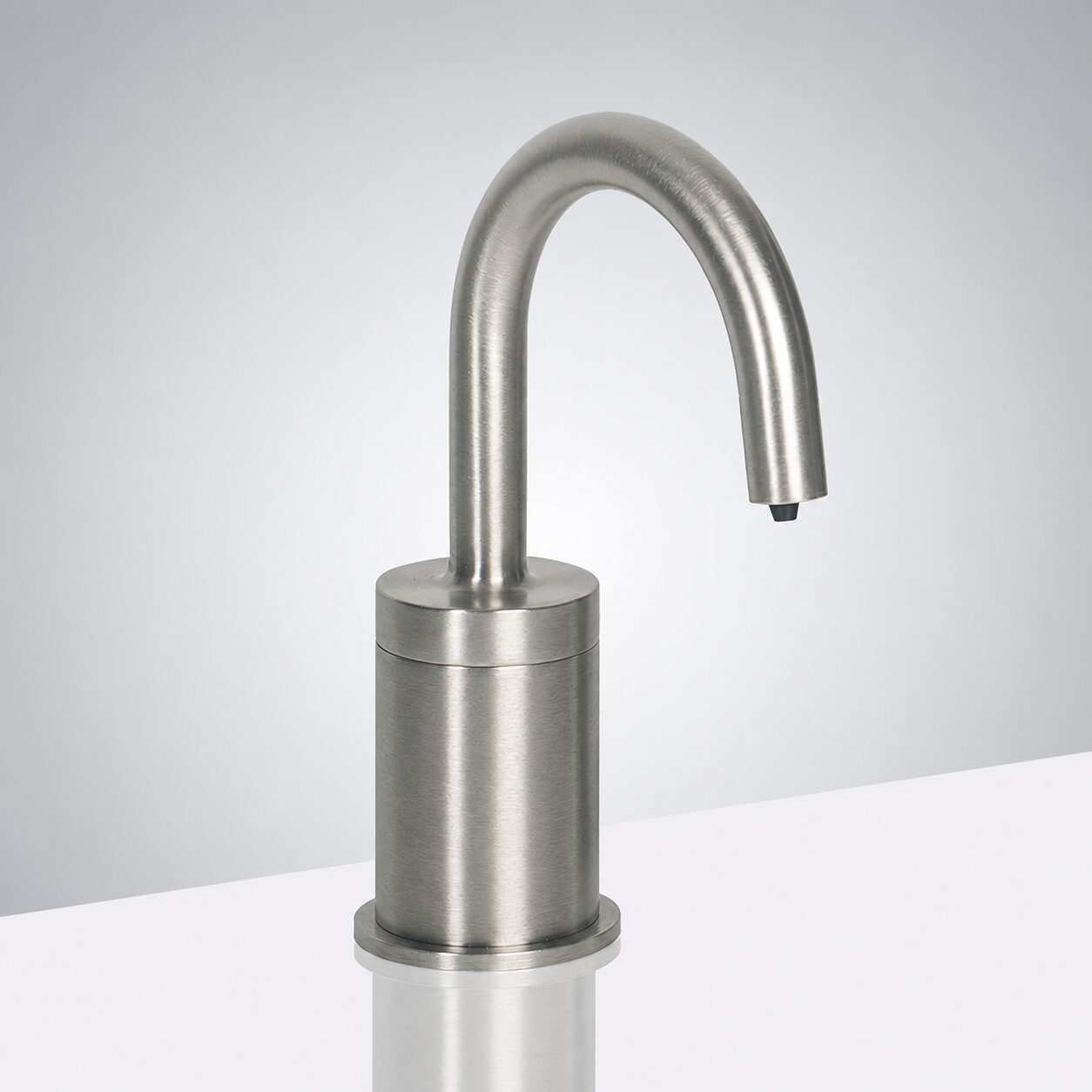 Brushed nickel touchless faucet with matching automatic soap dispenser