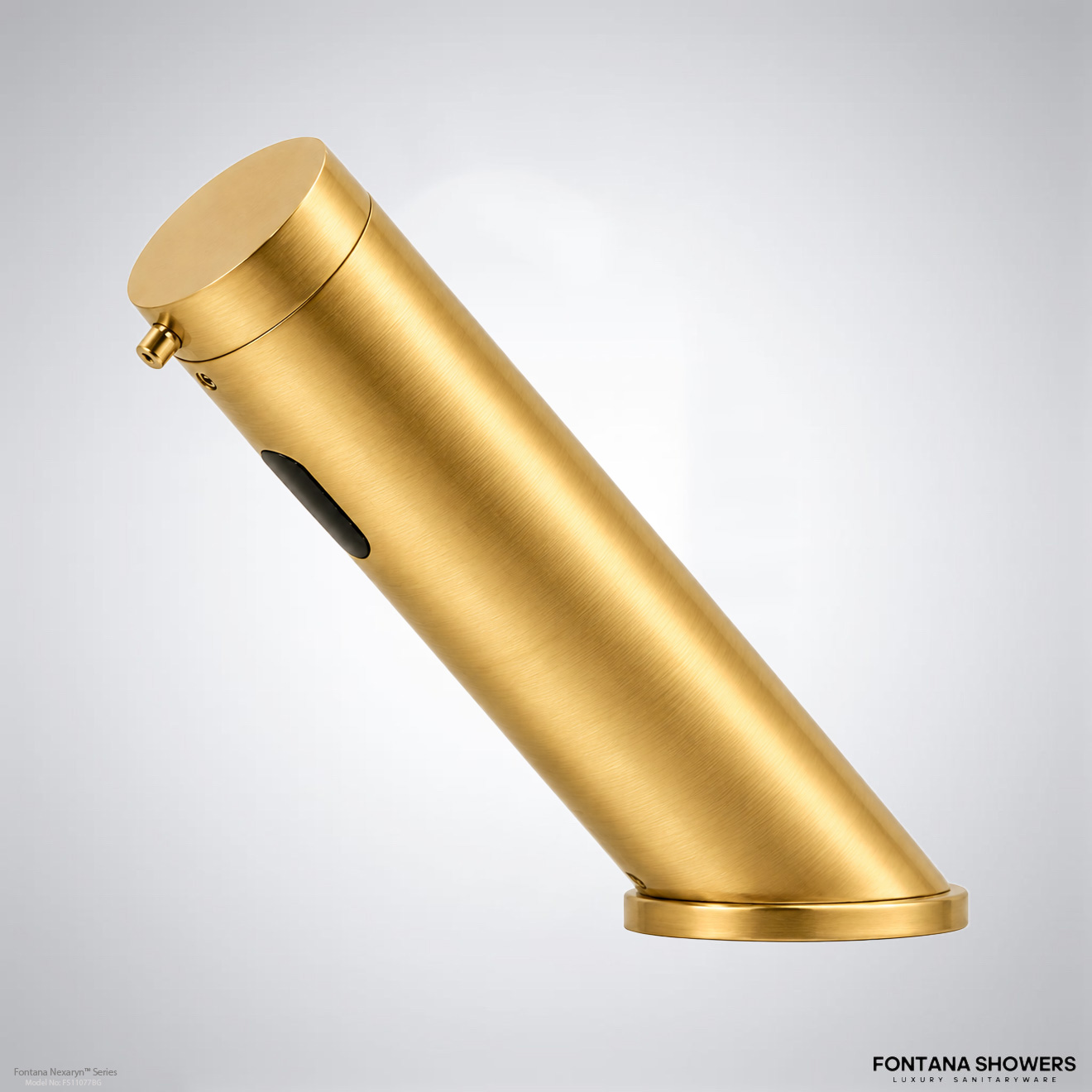 Gold automatic wall mounted soap dispenser installed in a commercial restroom wall setting